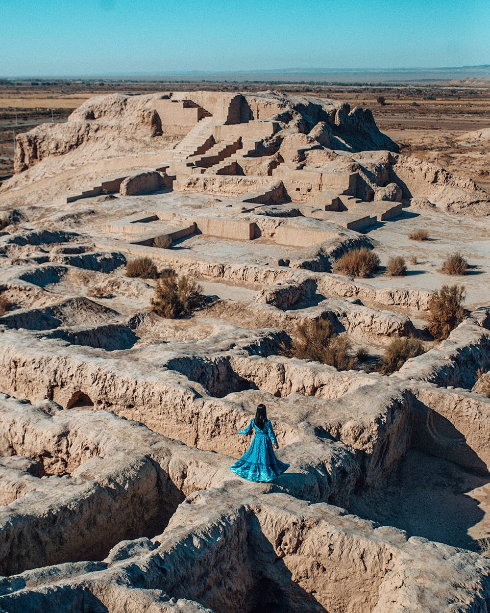 girl in desert tuprakkala in uzbekistan