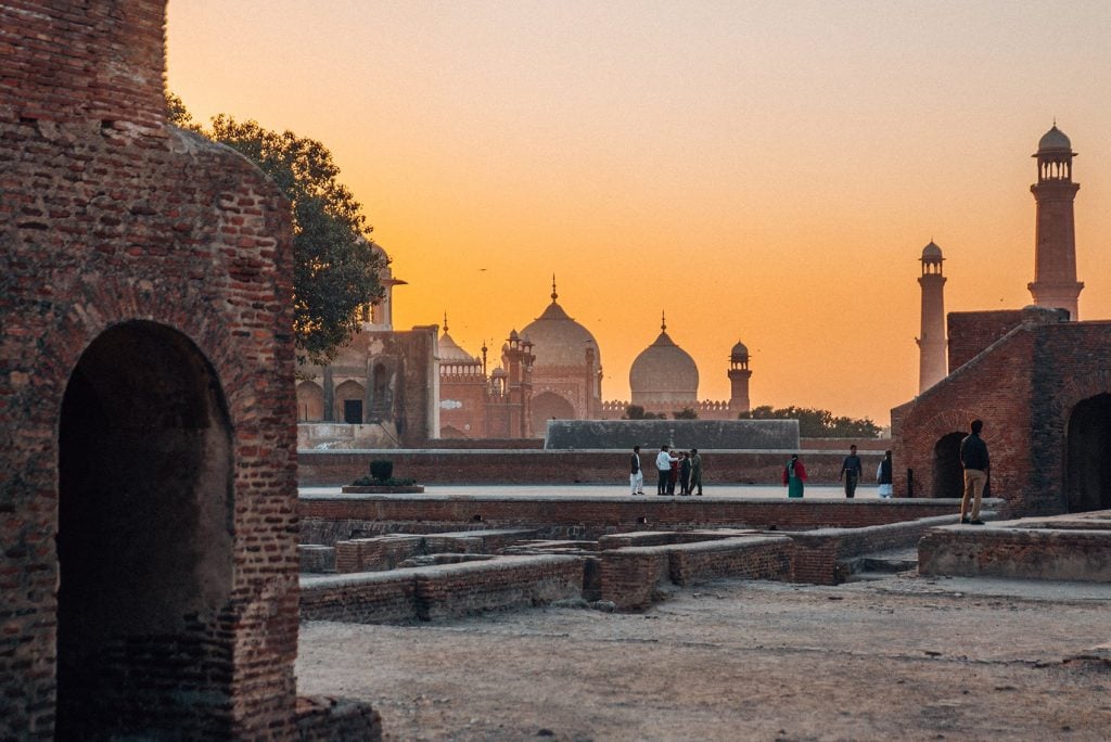 the view of badshahi mosque during sunset from lahore fort in pakistan