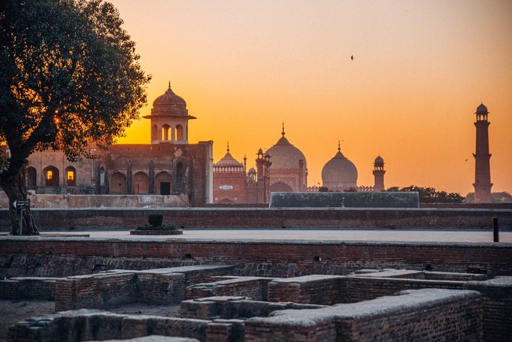 the view of badshahi mosque during sunset from lahore fort in pakistan