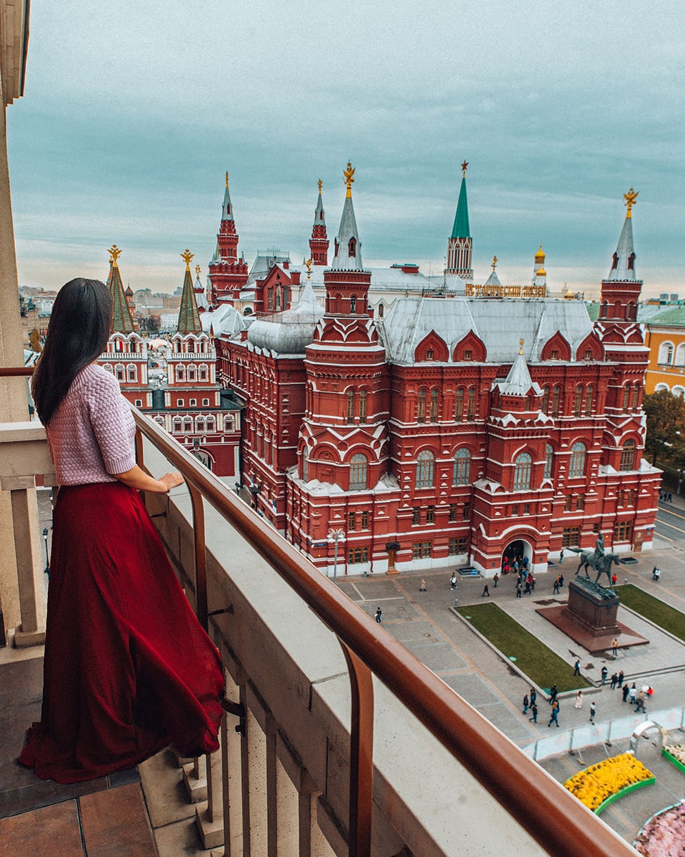 girl standing on the terrace of four seasons hotel in moscow russia