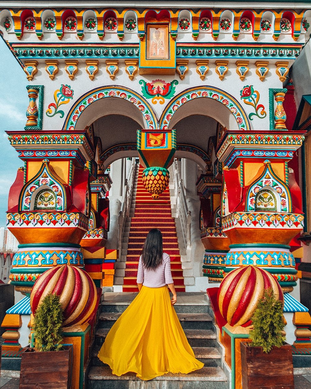 girl standing in izmailovo kremlin in moscow russia