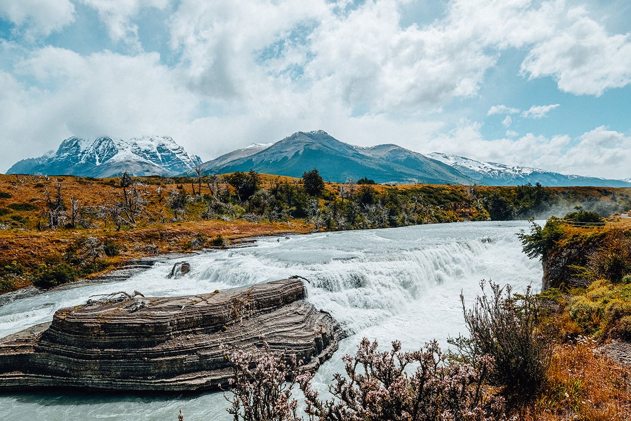 the view of mountain ranges and a river in patagonia chile