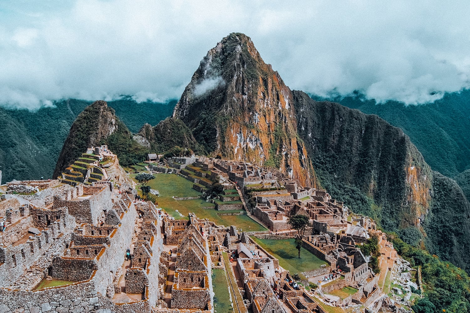 clouds over machu picchu in peru