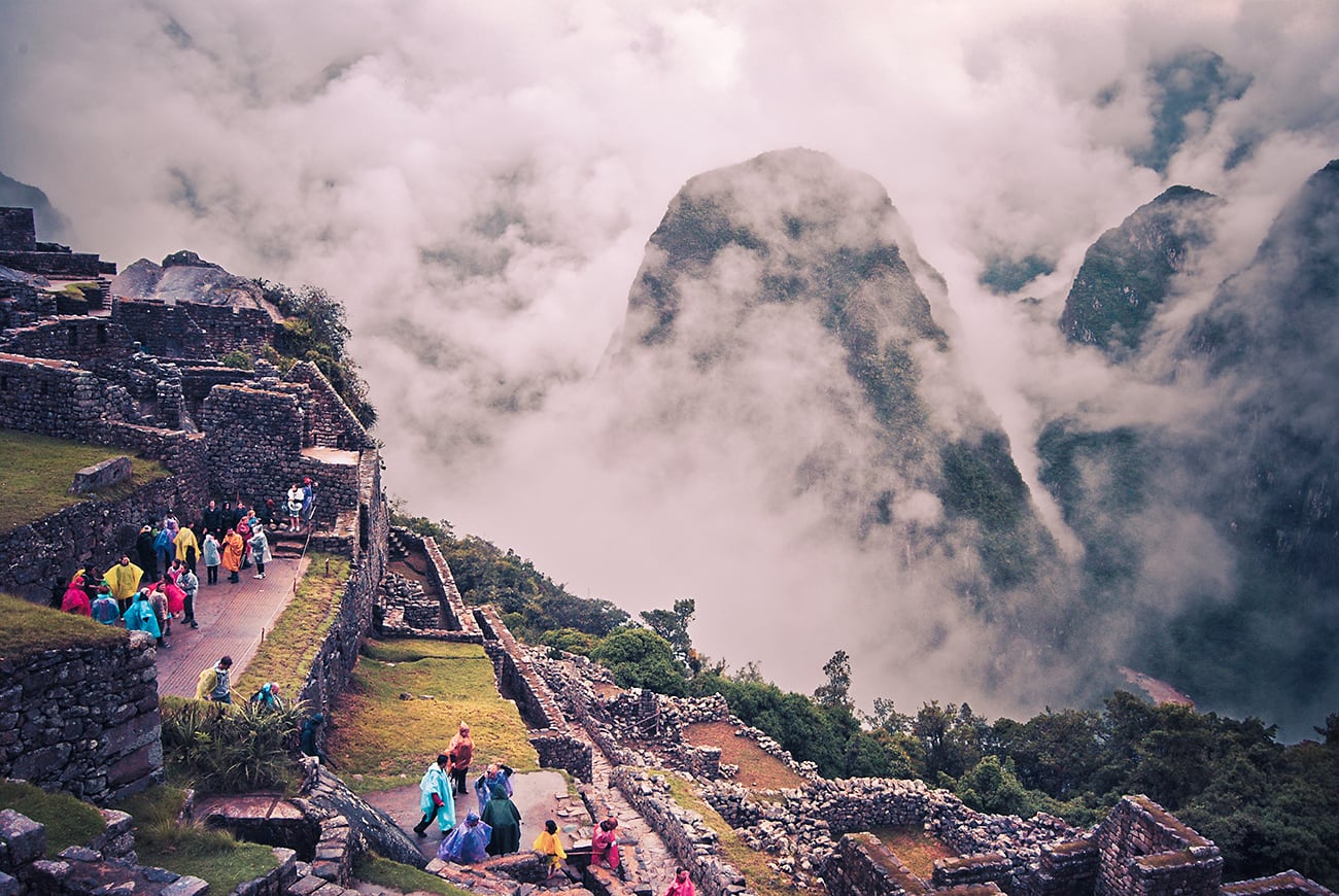 clouds over machu picchu in peru