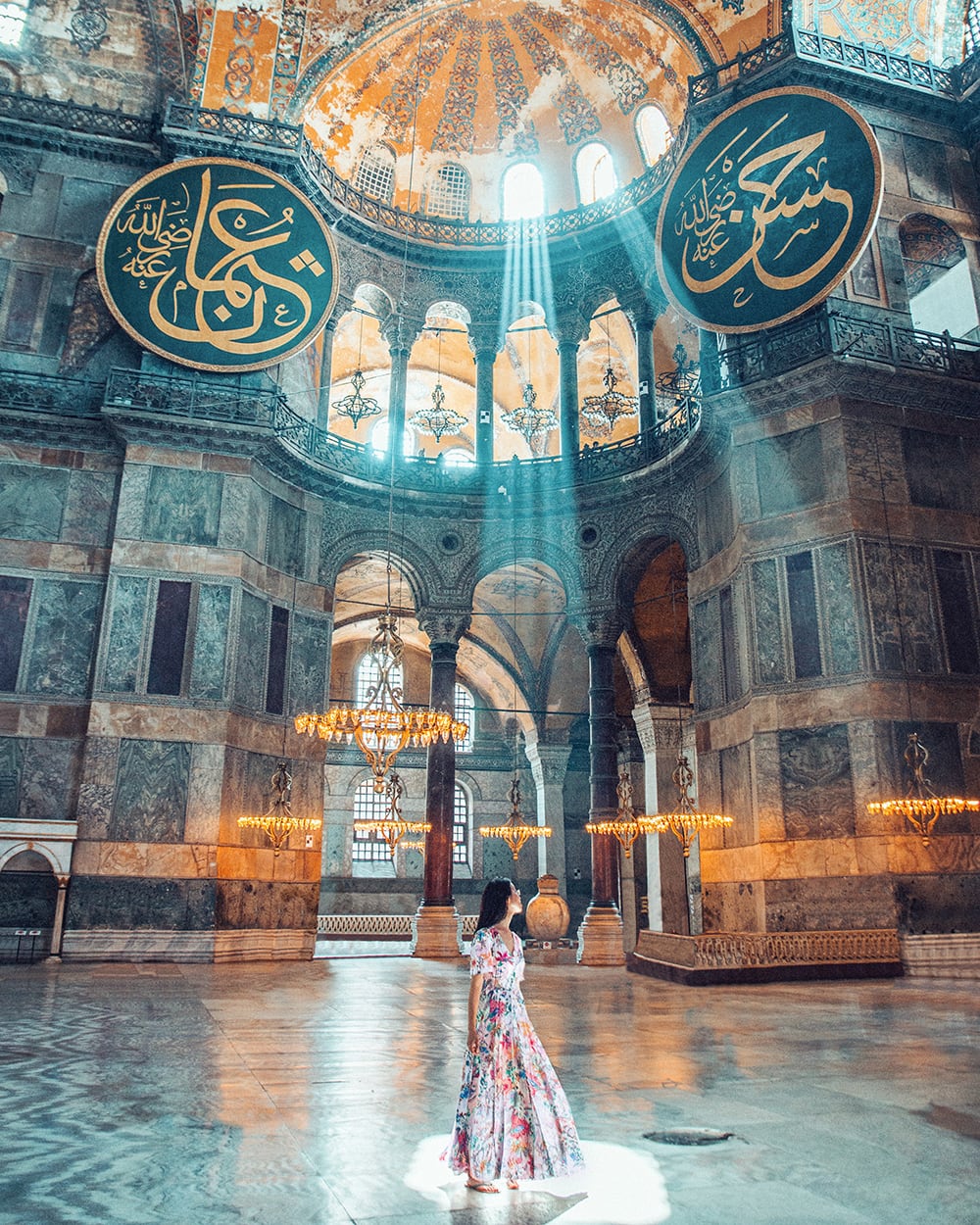 girl standing in hagia sophia museum in istanbul turkey