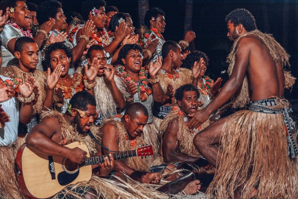 Local Fijians Performing a Traditional Dance in Costume