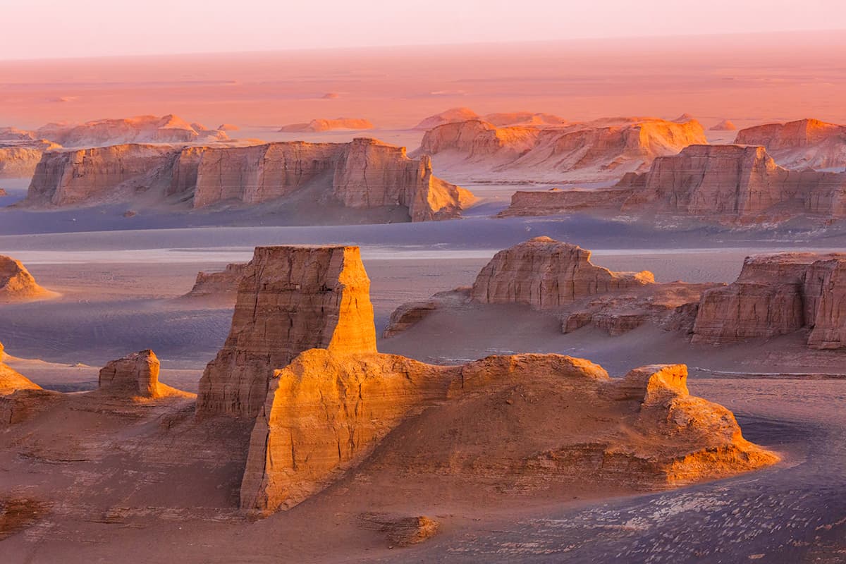 A Sun Setting in a Desert in Iran