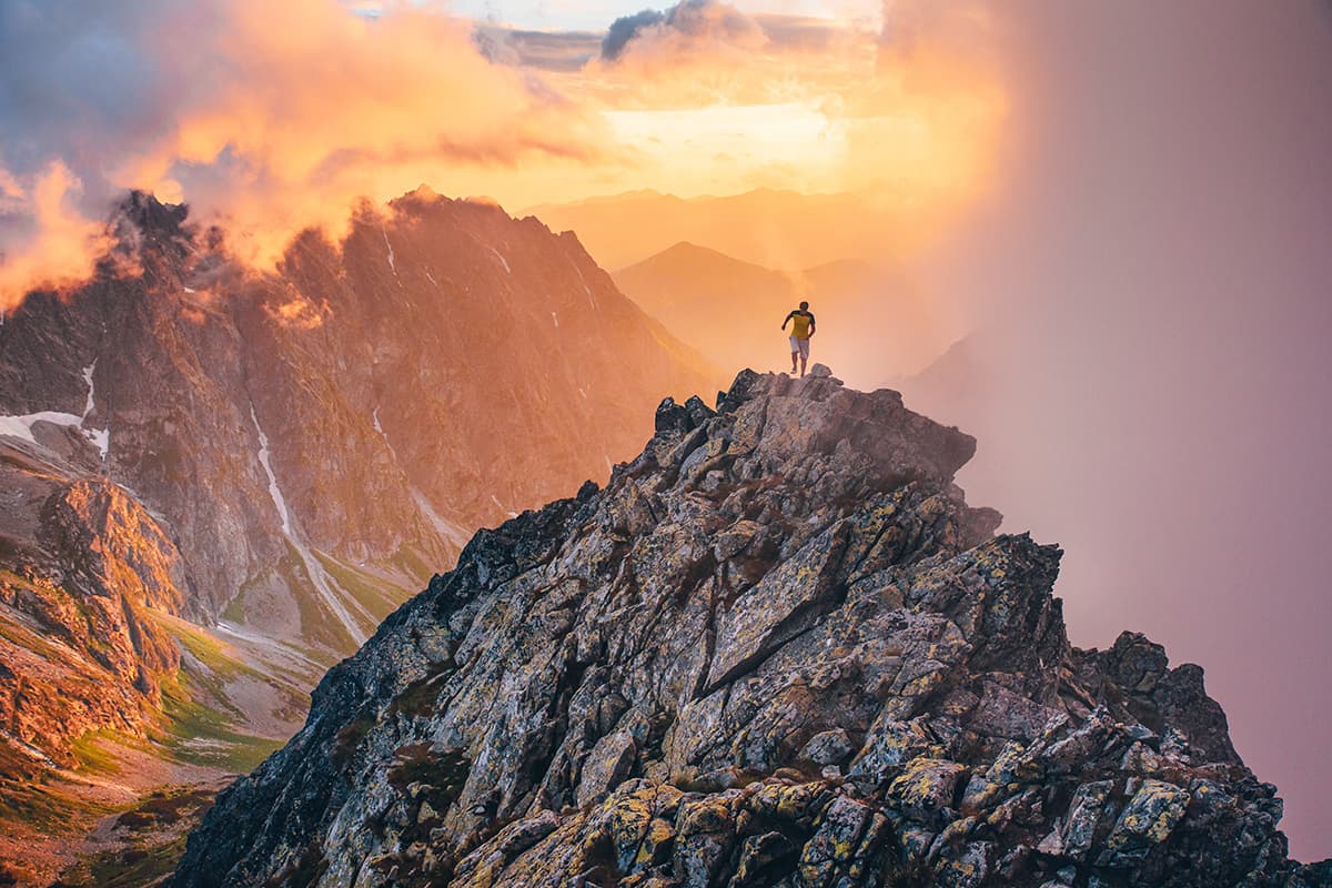 A Man Running on a Mountaintop