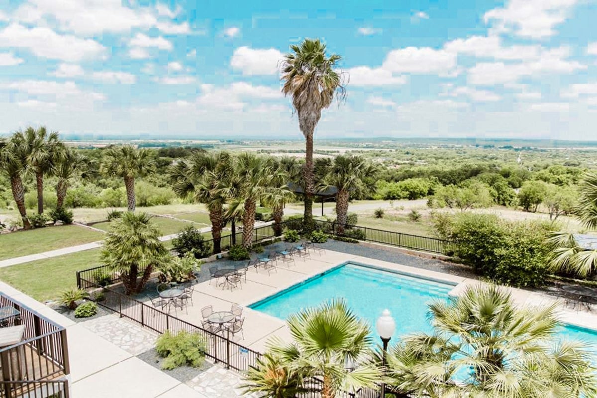 Tropical Hillside Boutique Hotel in Castroville, Texas